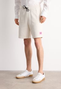 HUGO DIZ - Pantaloni de trening - open white
