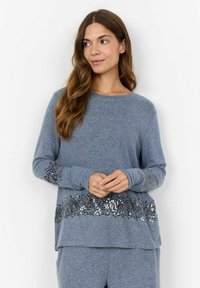 Blauwe long-sleeve top van zacht materiaal, met een hem en manchetten met een paillettenpatroon, in een relaxte pasvorm en met een ronde hals.