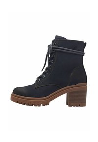 Bottine noire avec des lacets gris, semelle en caoutchouc et un talon marron texturé. Présente des détails de couture et un design à bout rond.