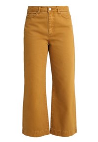 Jeans de algodón de color mostaza amarillo, de pierna ancha y cintura alta, con bolsillos frontales, cierre de botón y dobladillos cosidos. Textura suave, diseño casual.