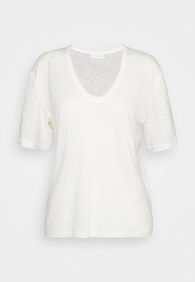 White, short-sleeve t-shirt with a V-neck design, featuring a relaxed fit and soft, textured fabric. No visible patterns or accents.