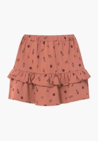 Perzikkleurige gerimpelde rok met een elastische tailleband, voorzien van botanische prints en stippen in tinten van bruin en geel.