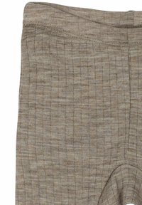 Leggings marrones texturizados con un patrón tejido, cintura alta y un ajuste ceñido, diseñados para la comodidad y versatilidad.