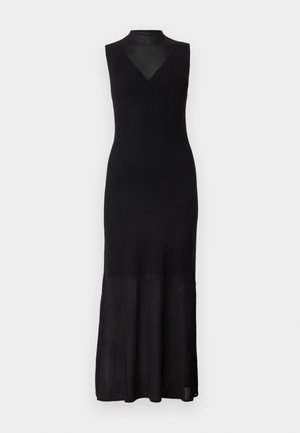 Robe maxi noire sans manches en tissu côtelé, avec col montant et panneau transparent au-dessus de la poitrine, cintrée aux hanches et évasée à l'ourlet.