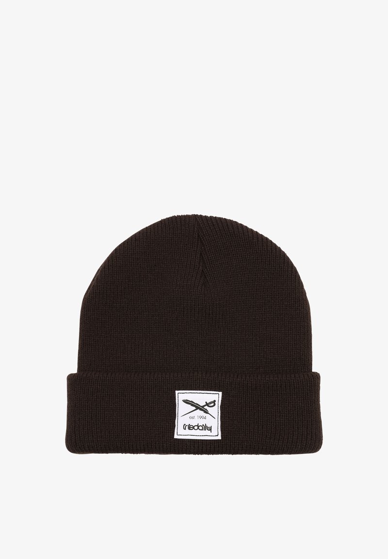 Brown knit beanie with a folded cuff, featuring a white label with black graphics and text. Soft texture, simple design, and no additional patterns.