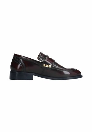 Burgundy leather loafers with a glossy finish, featuring a strap and three gold studs, a low black heel, and stitched detailing.