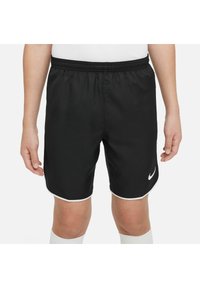 Shorts de sport noirs avec une taille élastique, des accents blancs et un petit logo Nike blanc sur la jambe gauche. Texture lisse.