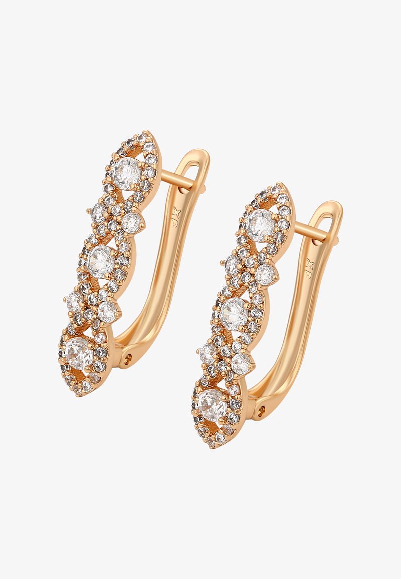 Ohrringe in Goldoptik mit einem wellenförmigen Design, verziert mit mehreren klaren Kristallen, die eine glänzende, glatte Textur und filigrane Details zeigen.