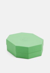 Hexagonal green box made of textured material. Features a raised emblem on the lid and a flat base. Well-structured and vibrant color.