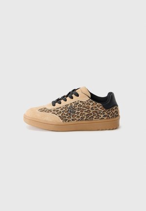 Low-top sneaker with tan suede toe, leopard print sides, black laces, and rubber sole on white background.