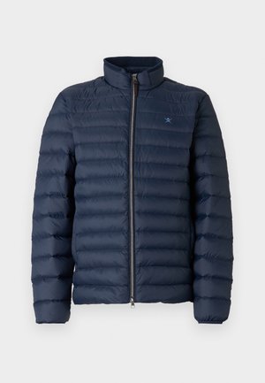 Giacca imbottita trapuntata blu navy con collo alto e zip frontale, con piccolo logo a remi incrociati sul petto.