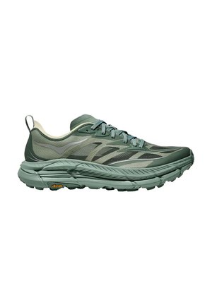 Zapatilla deportiva verde para correr con parte superior de malla estampada, suela gruesa acolchada, suela exterior Vibram y tirador en el talón.