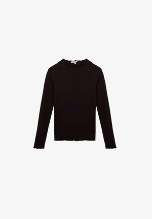 Czarna bluzka z długim rękawem, wykonana z materiału prążkowanego. Posiada falbaniasty dekolt i dół, o dopasowanym kroju.