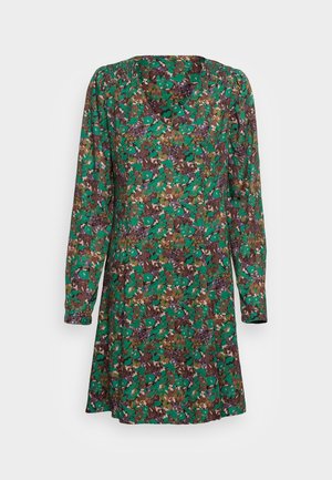 Sukienka z długim rękawem w zielonym materiale z kwiatowym wzorem w odcieniach fioletu, brązu i turkusu; luźny krój z dekoltem w serek.