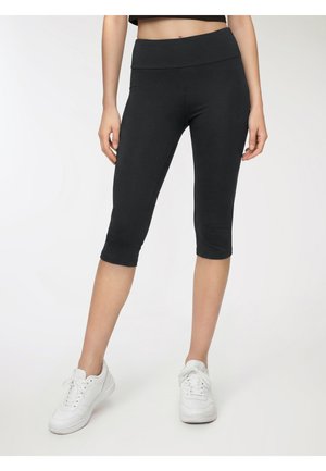 CORTO  - Leggings - nero