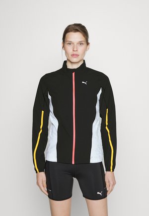 Veste de sport noire avec fermeture éclair rose à l'avant, panneaux latéraux blancs et bandes jaunes. Présente un col haut et un tissu léger.