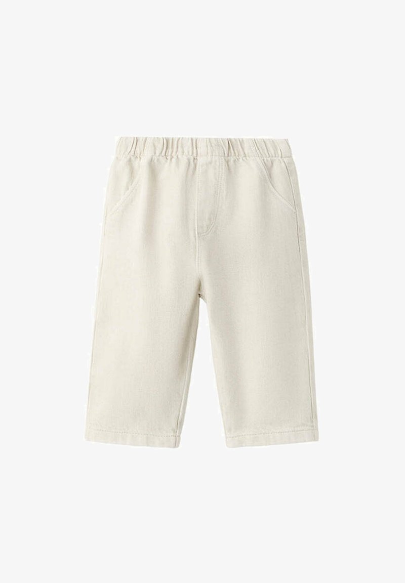 Shorts couleur crème pour tout-petits avec taille élastique et poches latérales, présentés sur un fond blanc uni.