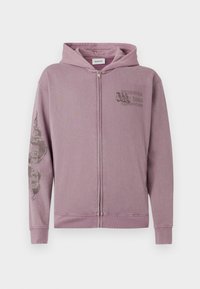 Sweatshirt rosa com fecho éclair, capuz com cordão, estampa frontal e gráfico discreto na manga. Tecido macio e punhos canelados.