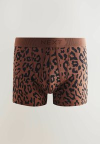 Brown boxer shorts featuring a black leopard print, made from stretchy fabric with a matching elastic waistband labeled "NEXT."