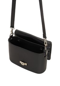 Black leather crossbody bag with a smooth texture, rounded shape, silver hardware, and a secure clasp on the front. Adjustable strap included.