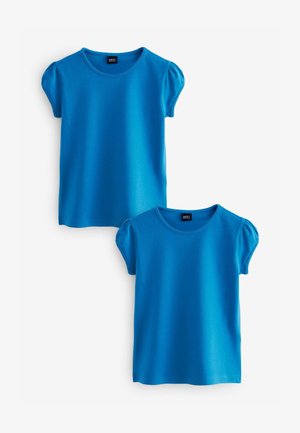 Dvije majice kratkih rukava u svijetloplavom pamuku. Imaju okrugli izrez i napuhane rukave, glatku teksturu i jednostavan dizajn.