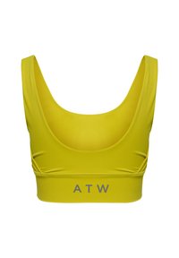 Gul sports-bh lavet af glat, strækbart stof; har brede stropper, en udskåret halsudskæring og et gråt logo langs båndet.