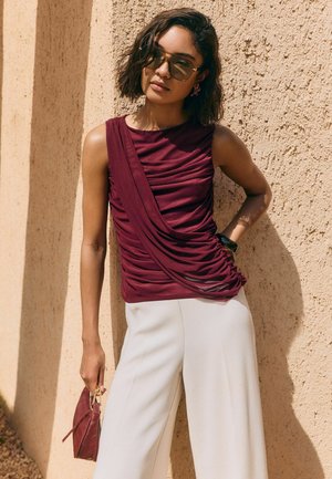 Friends Like These, SLEEVELESS MESH DRAPED TOP - Blouse - berry red