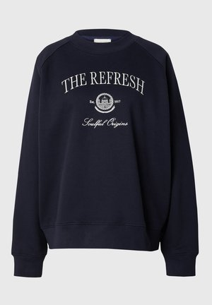Sudadera de cuello redondo en color marino, fabricada con material suave. Presenta texto bordado en blanco, puños acanalados y un corte relajado con un dobladillo recto.
