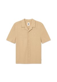 Chemise beige à manches courtes avec boutonnière, dotée d'un col pointu, d'un tissu texturé et d'un petit logo brodé sur le côté gauche de la poitrine.