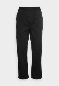 Black cotton trousers with an elastic waistband, straight legs, and side pockets. Smooth texture with no patterns or accents.