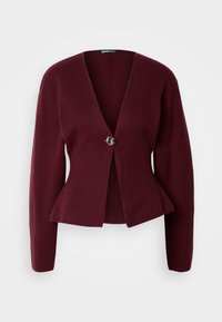 Bordová kardigán s výstrihom do V, dlhými rukávmi a peplum lemom. Obsahuje jedno dekoratívne gombík s kontrastným dizajnom. Mäkká textúra.