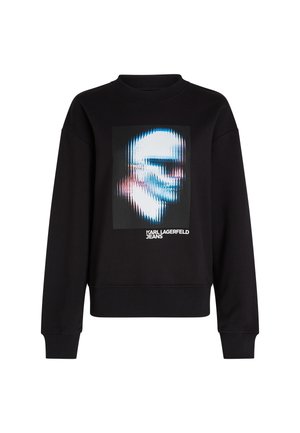 Juodas džemperis su įsiūta apykakle, kuriame centre pavaizduotas iškreiptas veidas ir žemiau esantis tekstas "KARL LAGERFELD JEANS".