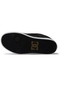 Black skate shoe sole featuring a textured rubber bottom, white edge, and a gold logo design. The tread pattern includes small squares.