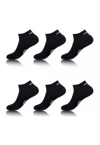 Six chaussettes noires mi-mollet avec des logos de marque blancs sur les revers et les côtés, disposées en deux rangées de trois sur un fond blanc.