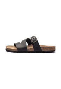 Black leather slide sandals with adjustable strap and buckle, cork footbed, textured rubber outsole, minimalist design.