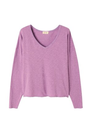 Light purple, long-sleeved V-neck sweater with a relaxed fit and soft texture, featuring a slightly cropped hem and minimal design.