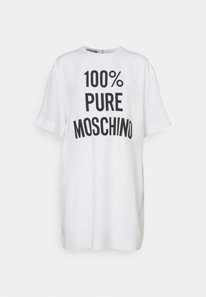 White t-shirt with short sleeves featuring bold black text reading "100% PURE MOSCHINO." Simple design and soft fabric texture.