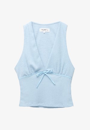 Top corto azzurro chiaro in tessuto strutturato, con scollatura a V profonda e un piccolo fiocco in vita. Design senza maniche con una forma aderente.
