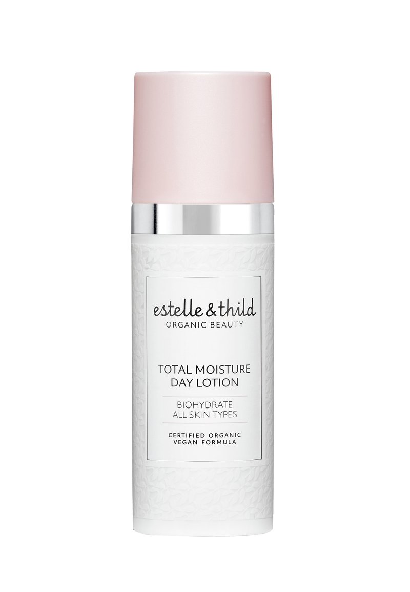 Bouteille cylindrique blanche avec une surface texturée, un capuchon rose mat et un accent argenté. L'étiquette affiche en évidence "Crème hydratante de jour totale".