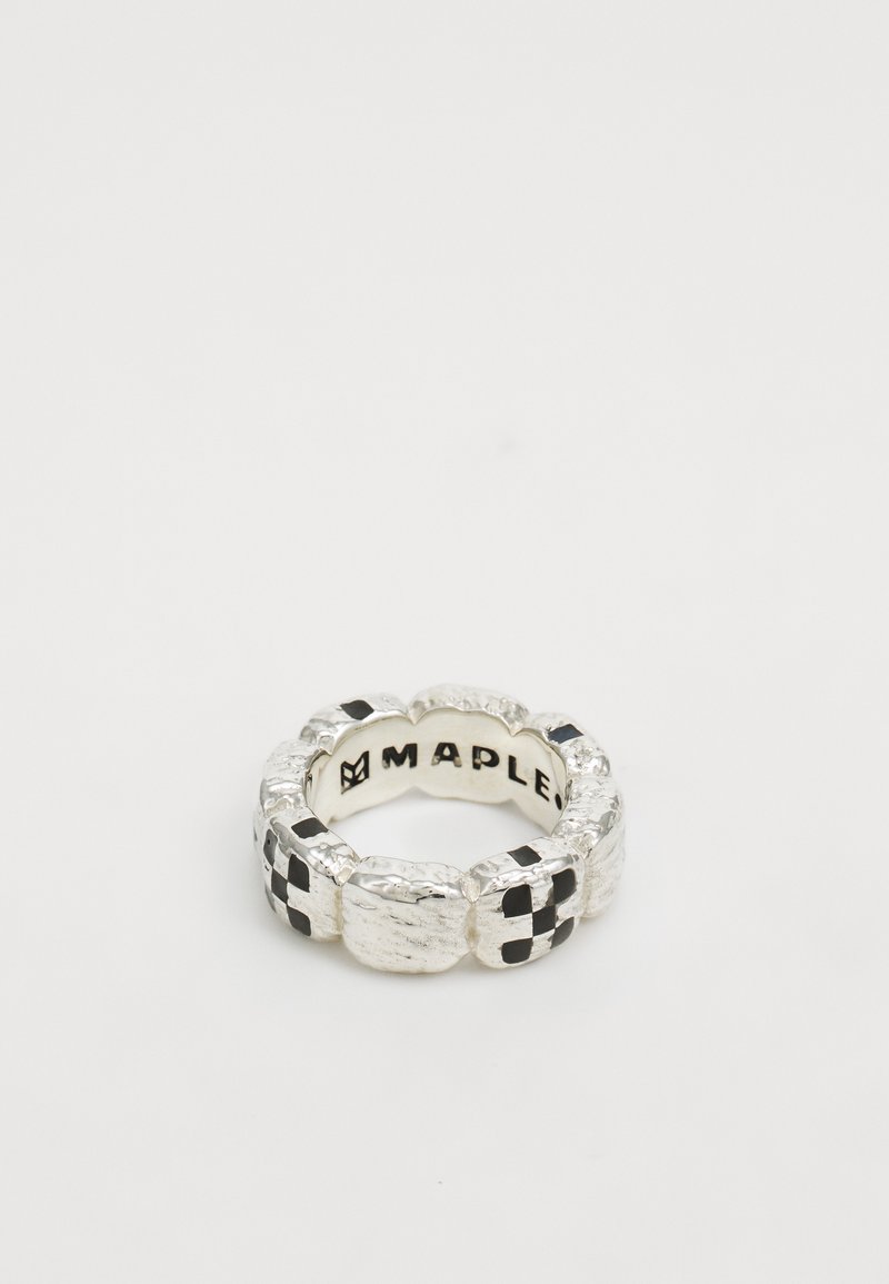 Silver ring with a textured design. Features alternating smooth and checkered black patterns. Engraved "MAPLE" inside.