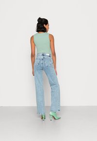 ONLY ONLJUICY WIDE LEG - Wide leg - light blue denim