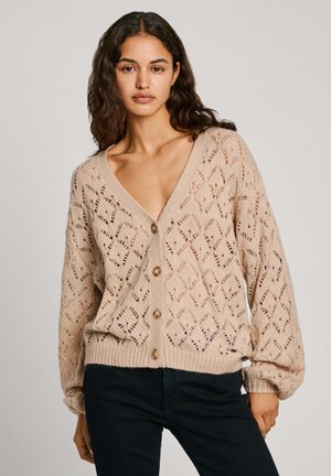 Cardigan beige a maglia con motivo a rombi, scollo a V, maniche lunghe e quattro bottoni sul davanti. Polsini e orlo a coste.