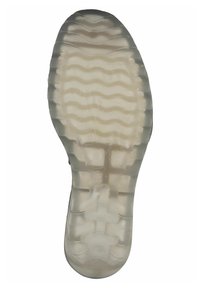 Suela de zapato de goma transparente con un patrón de banda de rodadura ondulado, que presenta una textura lisa y transparente y acanaladuras distintas para el agarre y el soporte.