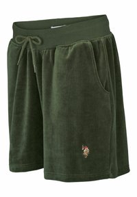 Short en velours vert foncé avec taille élastique, cordon de serrage, poches latérales et logo joueur de polo brodé sur la jambe gauche.