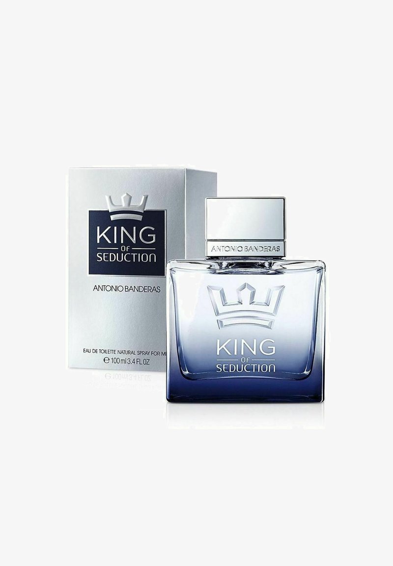 Klar glasflaska med en blå gradient, silverfyrkantig kork och präglad krona. Inkluderar vit låda med varumärket "King of Seduction".