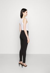 ONLY ONLBLUSH  - Calças de ganga de corte skinny - black denim