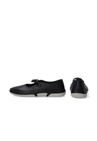 Schwarze Lederschuhe mit runder Zehenpartie, dekorativem Schleifenverschluss und flexibler Gummisohle mit strukturiertem Profil für besseren Halt.