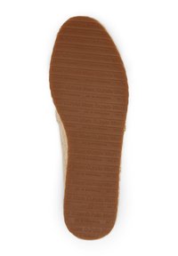 Semelle de chaussure en caoutchouc marron avec des motifs texturés et des gravures ; présente le nom de la marque et la taille 37. Bord supérieur lisse avec un tissu léger visible.