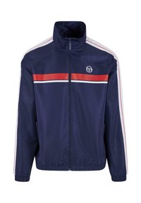 Námornícky zip s vysokým golierom, biele a červené pruhy na pleciach, elastické manžety a logo na ľavej hrudi. Hladká, syntetická tkanina.
