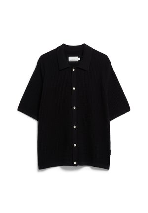 Schwarzes Kurzarmhemd mit strukturiertem Waffelstrickdesign. Verfügt über eine durchgehende Knopfleiste mit weißen Knöpfen und einem klassischen Kragen.